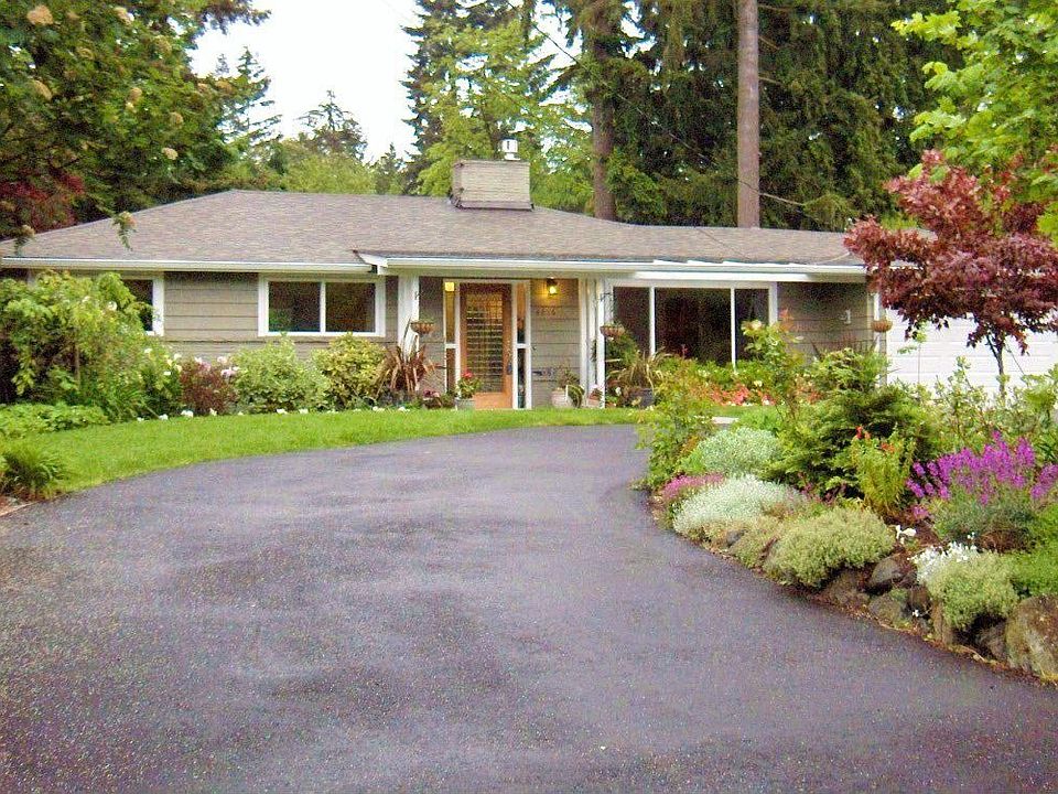 Front of home from street. Drive, walkway, 2 car garage door & roof all new.