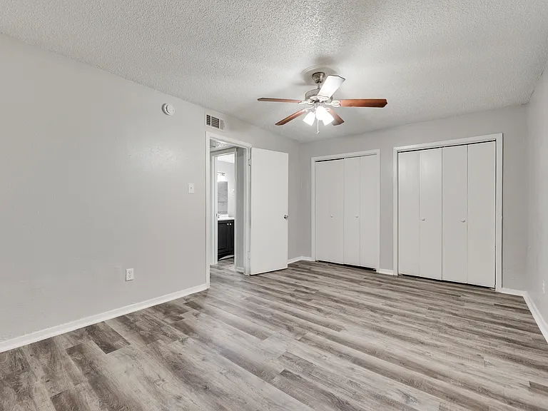 Large bedroom with two closets
