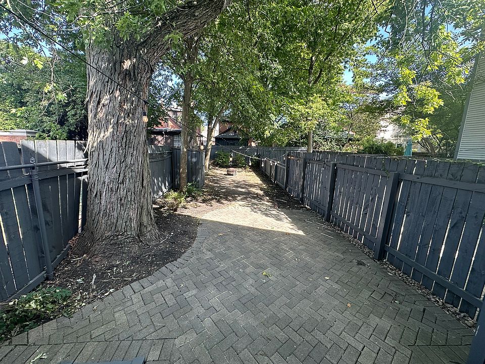 View of the fenced in patio and private backyard