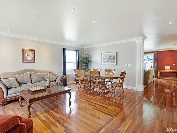 Large living and dining room with Brazilian hardwood floors.