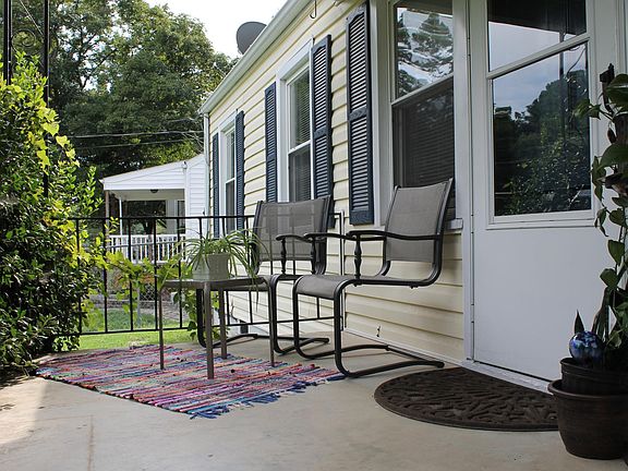 Front porch with cute patio furniture