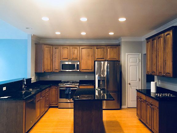 frontal view of kitchen area; 42 inch upgraded wood cabinetr
