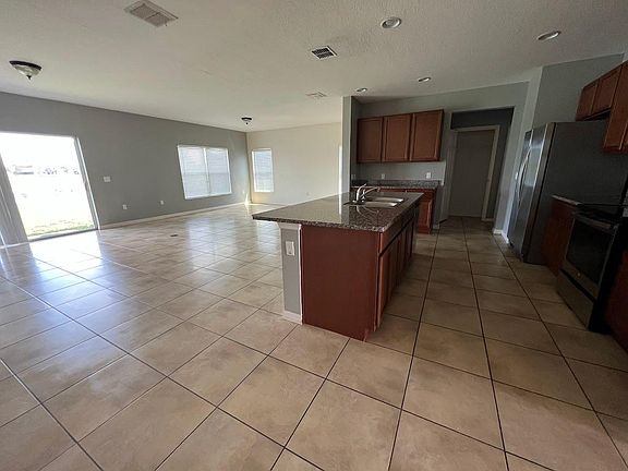 3rd image of 4989 Whistling Wind Ave