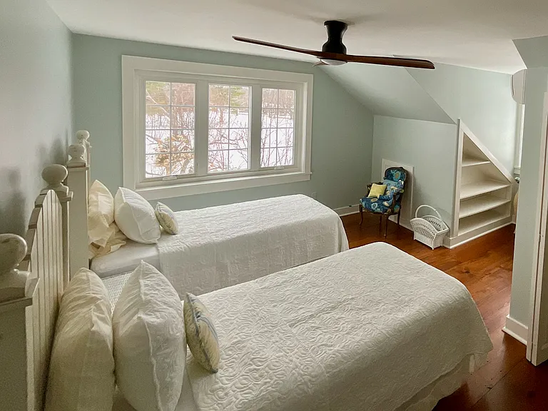 Upstairs bedroom shares a full bath with third bedroom