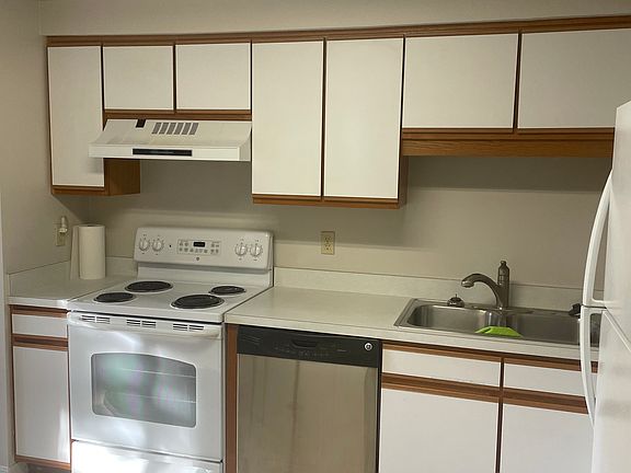 Kitchen. The stove has been upgraded to glass top stove.