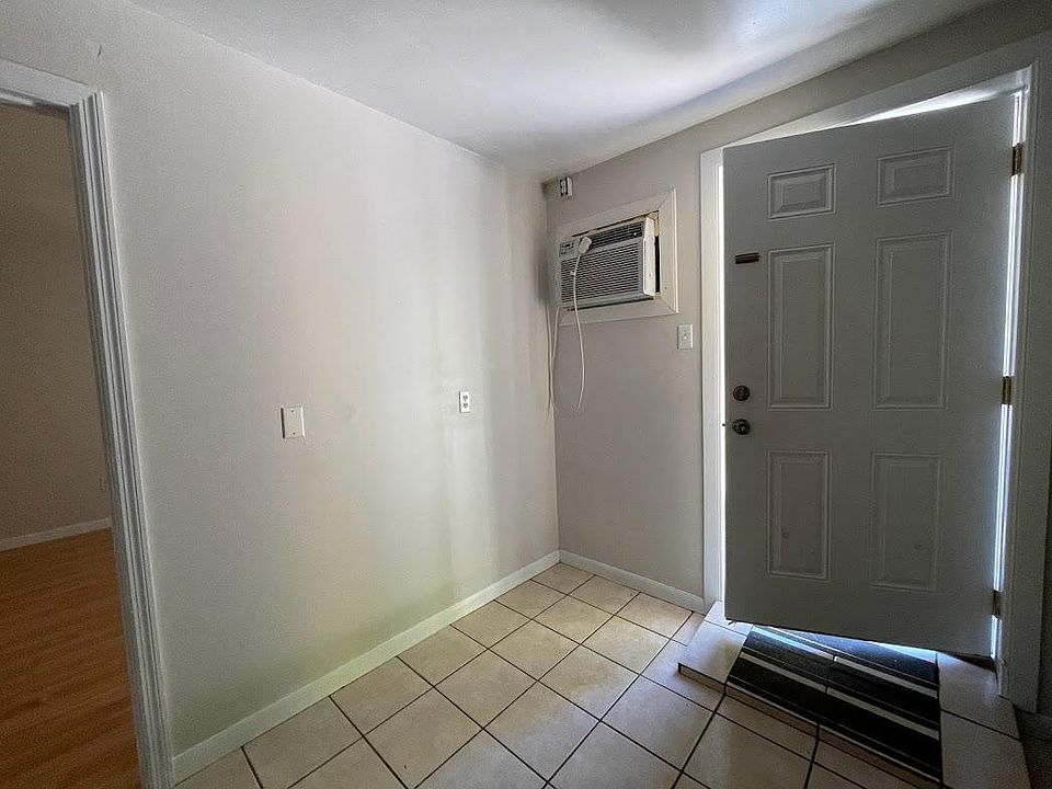 Front Door leading into Kitchen Area