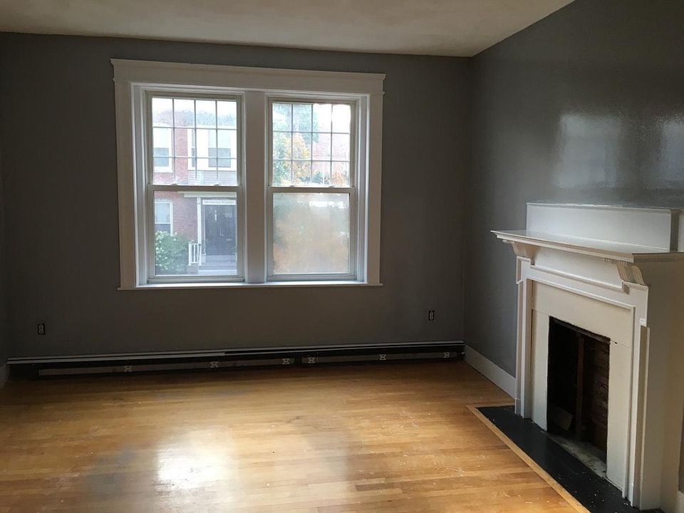Beautiful living room with faux fireplace