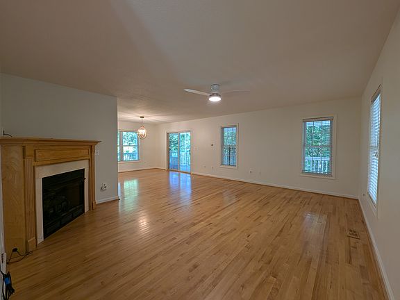 As seen as you enter the house. Living room, gas fireplace and formal dining area.