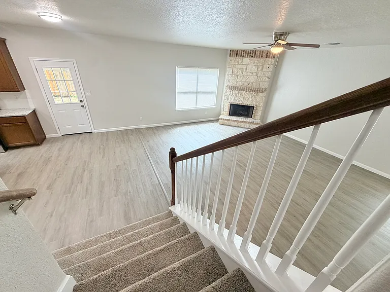 4 bedrooms and 2 full bathrooms are upstairs