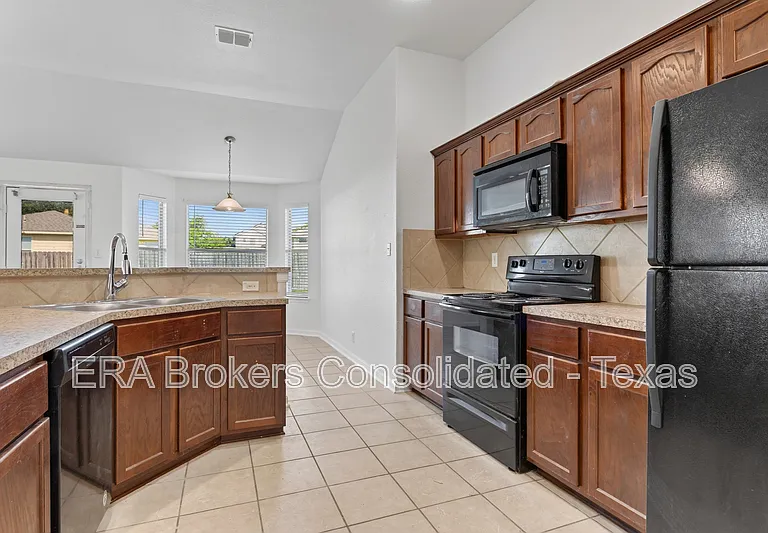 7703 Brisbane Bnd — Photo 13