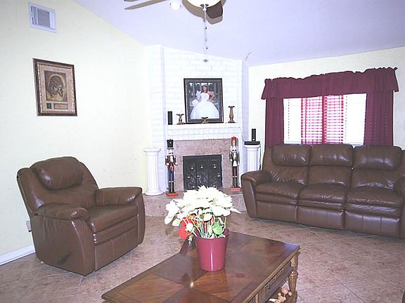 The family room also boasts of a corner fireplace.