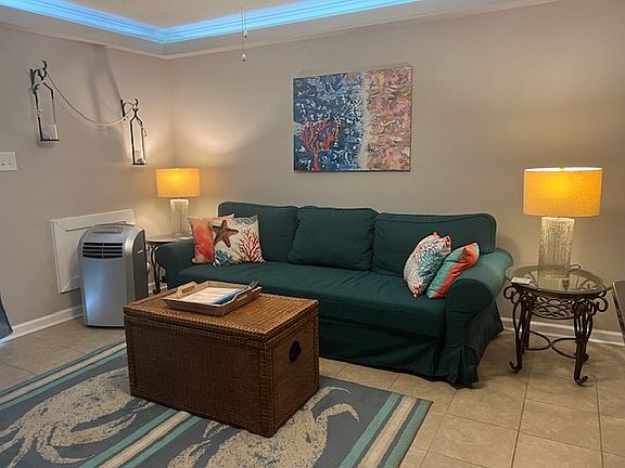 Fun beachy vibe. Pullout sofa.