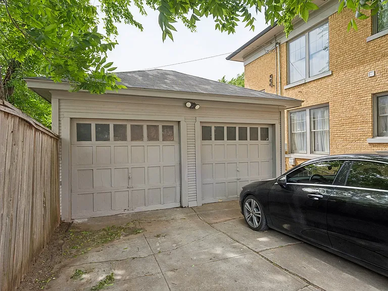 Garage on right is for downstairs unit.