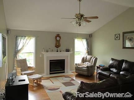 Living room
						:
						Large living room offers vaulted celings, hardwood floors, gas logs.