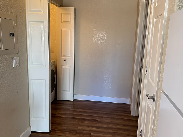 Interior hallway leading to bedrooms and bathroom