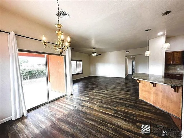 11857 E 27th Pl — Photo 7
