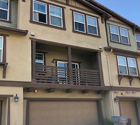Back View: Garage and Back Balcony