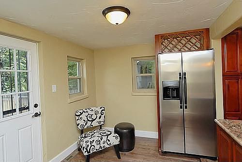 Kitchen opens to private backyard garden!