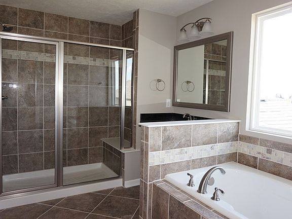 The Markham Owner's Bath with walk-in shower