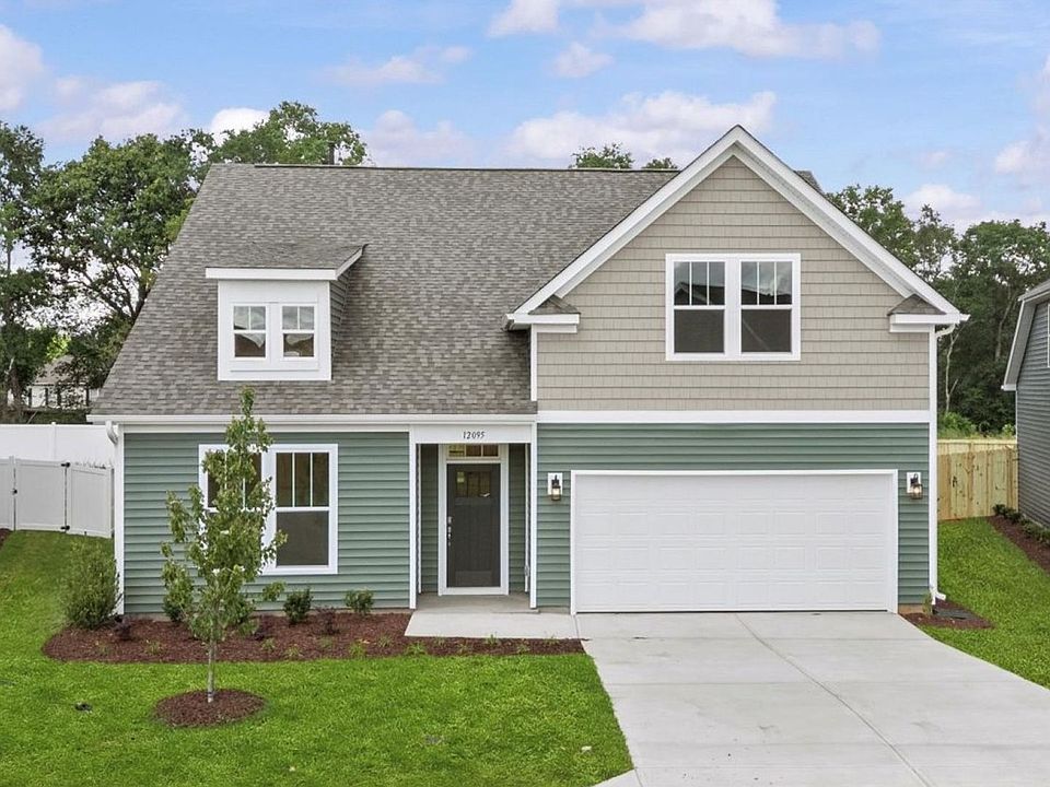 DRB Homes Walnut Ridge community featuring the Cooper 3 in a stunning bright white exterior with st