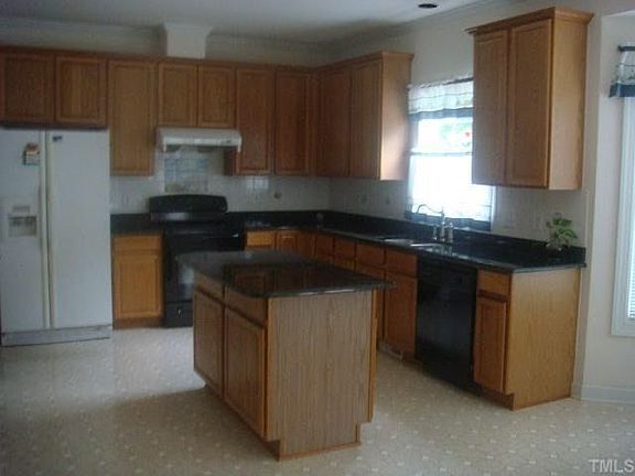 Spacious Kitchen with Granite Counter-tops
