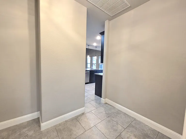 open area off of garage and laundry room