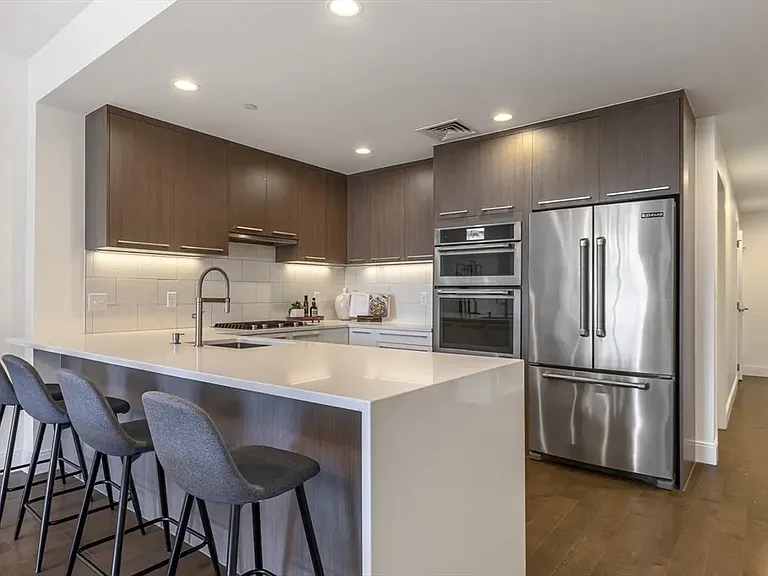 Kitchen photo from old listing - furniture is different now see other photos