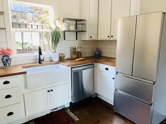 Newer stainless steel dishwasher and French Door refrigerator/freezer.