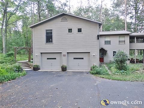 2 car attached garage and paved drive