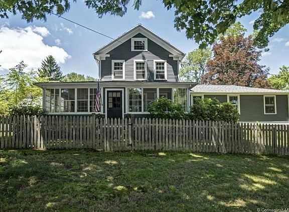 Charming farmhouse exterior belies what is within.