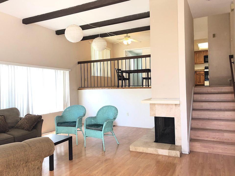 Huge and bright high ceiling Living room: 20'x19'
Has fireplace, Patio, Coat Closet