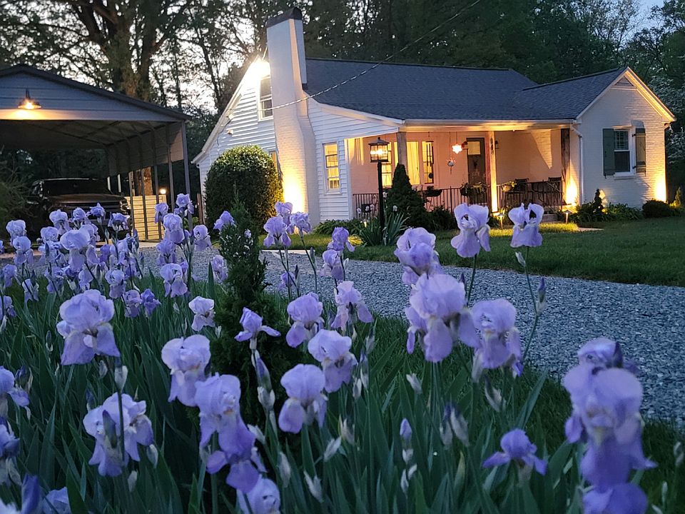 This home has architectural lighting. The two-car carport is oversized and sits on a concrete pad. You do not have to maintain the yard. We do it for you.