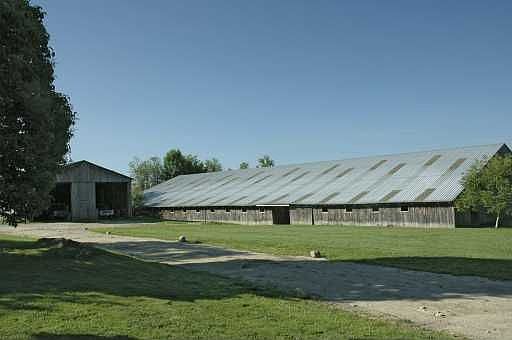 210 acres with barns,riding arenas and polo field