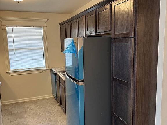 Brand new cabinets and crown molding.