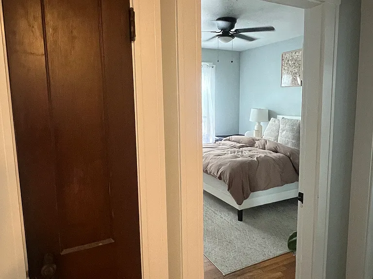 Look inside bedroom 1 from hallway