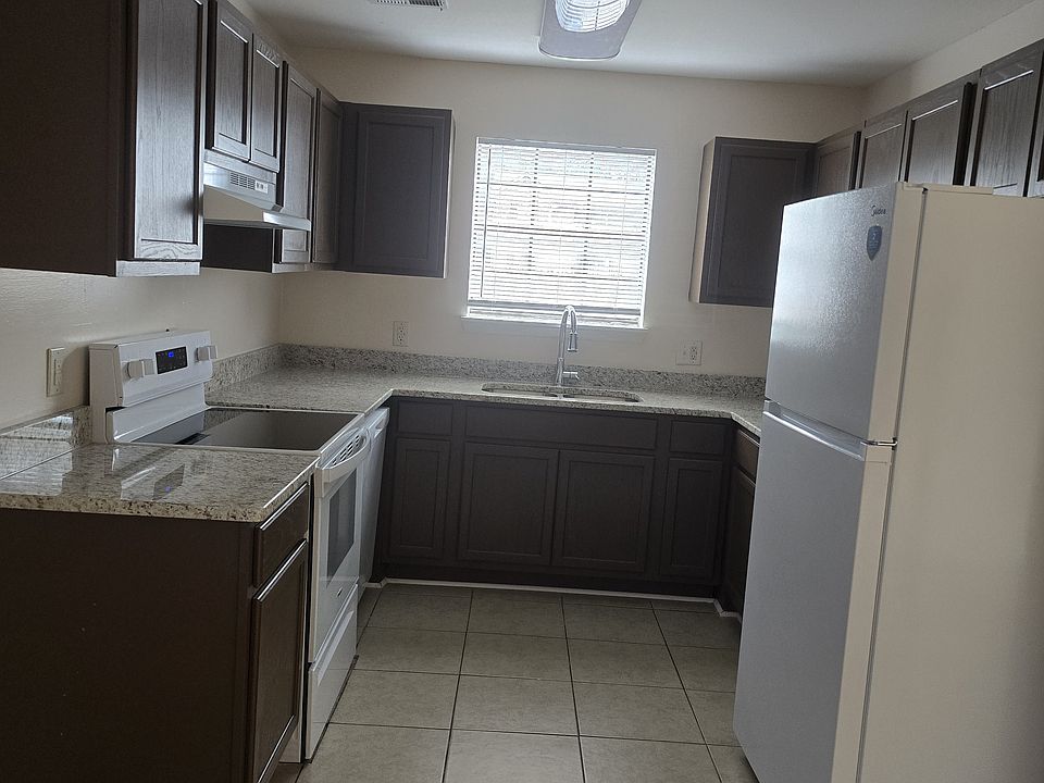 Kitchen with all new appliances, cabinets and granite tops
