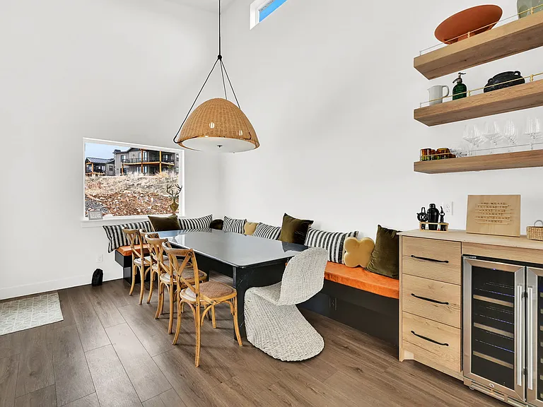 Dining area with wine fridge and bar