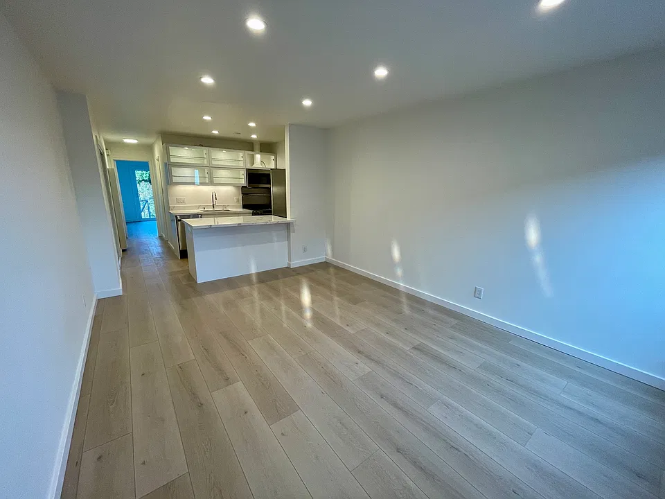 Living room facing kitchen