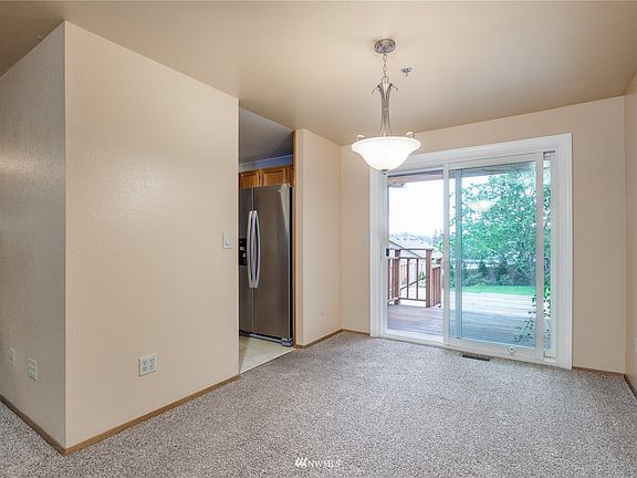 Dining room opens to covered back deck