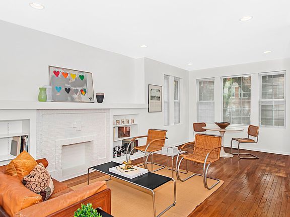 Features fireplace with gas line.