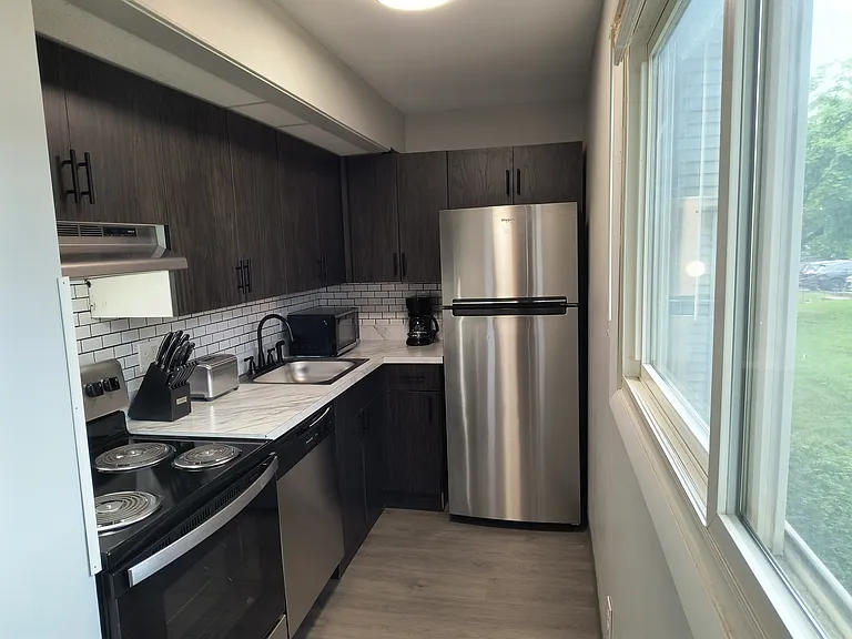 Cedar Village Apartments and Townhomes — Photo 26