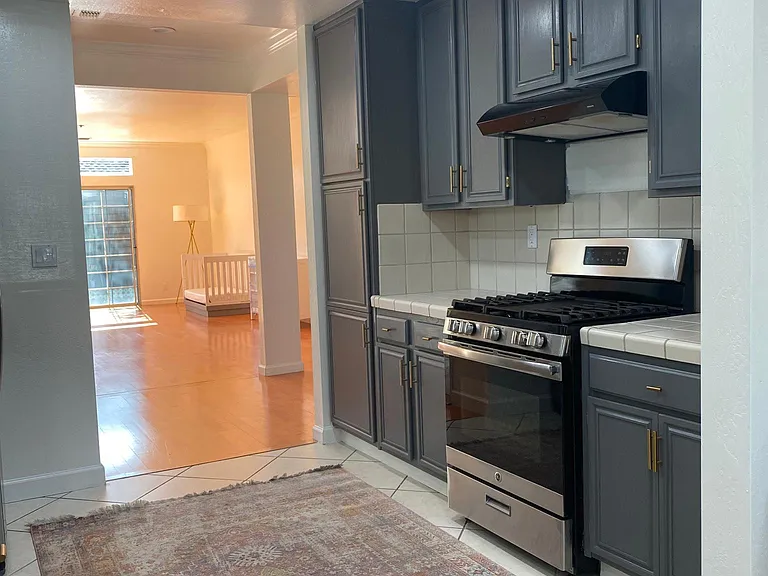 Kitchen with open flow to Living Room