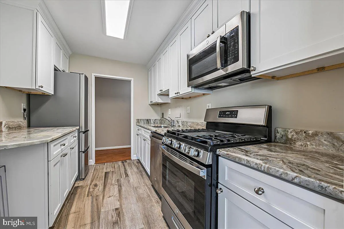 Building Photo - 6631 Wakefield Dr #203