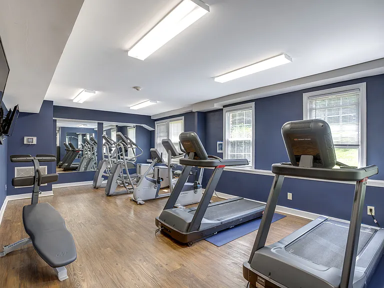 a fitness center with treadmills at Park Crest Apartments, District of Columbia 20007