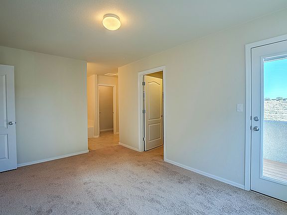 Master bedroom has a private patio, walk-in closet and ensuite bath