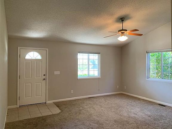 Living room facing front door.