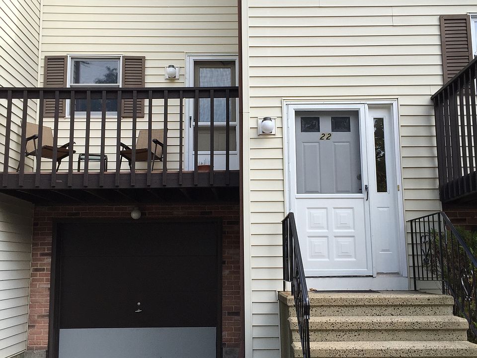 Front: Attached Garage and Kitchen Balcony