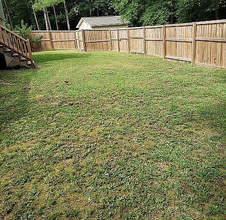 Privacy fence enclosing deck