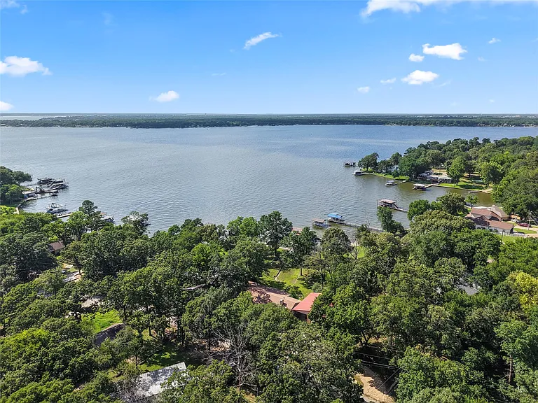 Expansive water body with surrounding treeline
