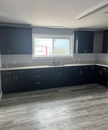 4th image of 255 Laroussini St